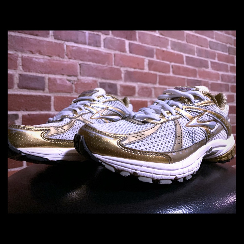 Brooks GTS 10th edition running sneakers in gold
